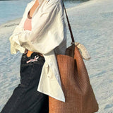 Soleil Sac – Bolso ovalado de rafia