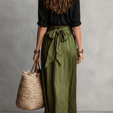 CONJUNTO BOHO CON BLUSA NEGRA Y FALDA MIDI DE SATÉN VERDE OLIVA