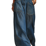 VAQUEROS DE PIERNA ANCHA CON LAVADO VINTAGE Y ESTILO BOHEMIO