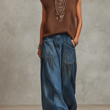 VAQUEROS DE PIERNA ANCHA CON LAVADO VINTAGE Y ESTILO BOHEMIO