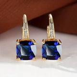 Pendientes Hoop Dorados con Piedras Misteriosas