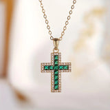 Collar de oro con cruz de esmeralda