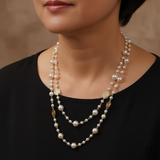 Collar de oro elegante con pequeña perla