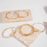 Conjunto de joyas elegante con nudos