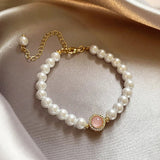 Pulsera retro con perlas y cuarzo rosa