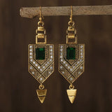 Pendientes geométricos retro en color dorado y verde