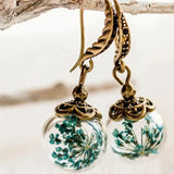 Pendientes retro con flores en oro antiguo