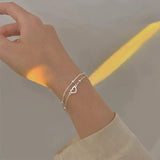 Pulsera ajustable con corazón de plata