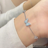 Conjunto de Collar y Pulsera con Mariposa Brillante Azul