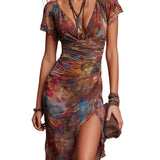VESTIDO MIDI PLISADO CON ESTAMPADO ARTÍSTICO BOHO