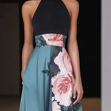 VESTIDO LARGO NEGRO CON ESTAMPADO FLORAL Y CORTE A