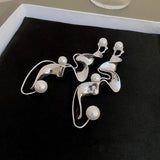 Pendientes abstractos vintage en plata con perlas